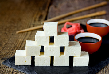 Tofu cheese, cut into cubes, with marinated ginger and soy sauce. Traditional cuisine. Selective...