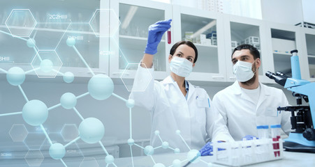 young scientists making test or research in lab