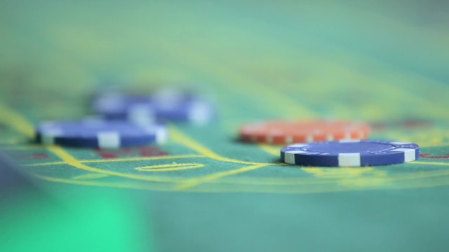 the dealer collects chips from the roulette field