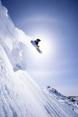 Photo sur Aluminium Sports dhiver Snowboarder flying with mountains