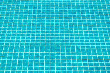 Tiles on swimming pool ground, background texture.