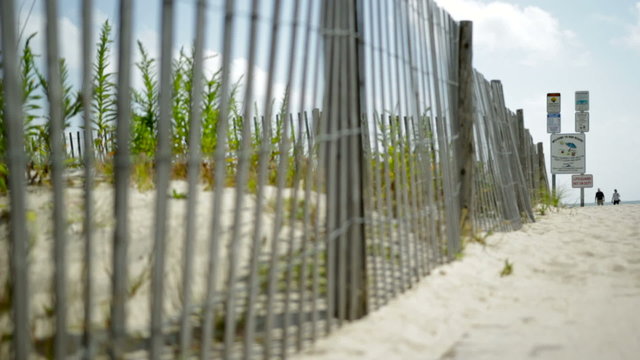 Beach fence pathway rack focus in Cape May, New Jersey.