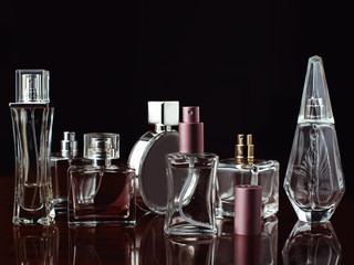 set of perfumes over dark