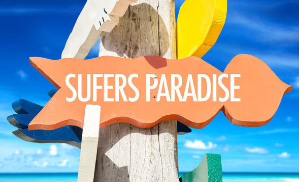 Surfers Paradise welcome sign with beach