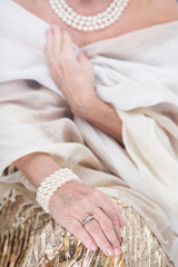 She knows how to wear pearls