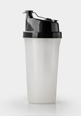 Plastic shaker isolated on white background with clipping path. Shaker for sport food cocktail. Black and white. Sport and healthy drink.