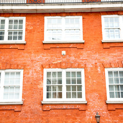 old window in europe london  red brick wall and      historical