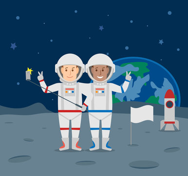 selfie on moon.astronauts taking selfie portrait with smart phone and selfie stick on moon