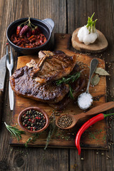 Juicy, tasty beef steak grilled with aromatic spices and seasoni