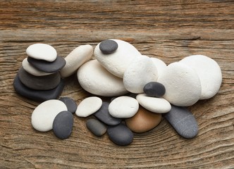 Stones on wooden background