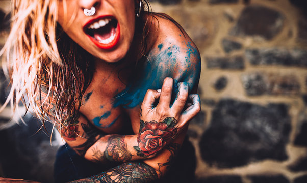 Naked Woman with Tattooes