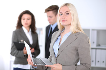 Fototapeta premium Beautiful cheerful smiling business woman