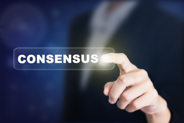 Businessman pressing a CONSENSUS concept button. Can be used in advertising.