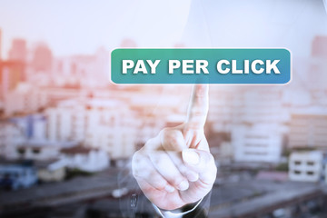Businessman hand touch screen graph on PAY PER CLICK. Can be used for your ad.