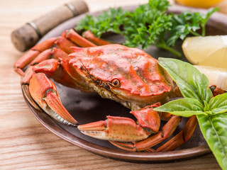 Cooked crab with lemon and herbs.