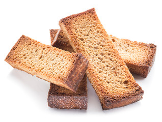 Bread croutons isolated on a white background.