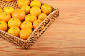Mandarin on wickered tray