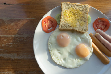 American breakfast with double fried egg