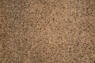 Concrete old wall with small pebble background.