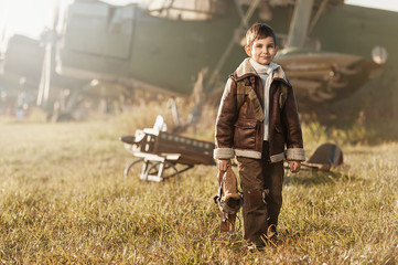 Portrait of a young aviator parked aircraft © Alexandr Vasilyev