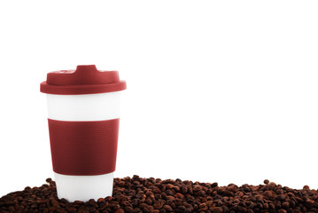 Takeaway ceramic cup and coffee beans. isolated.