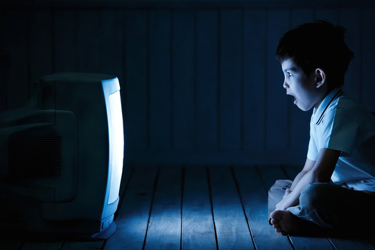 Boy Watching TV At Night
