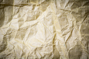 Recycled paper crumble texture background with vignette effect