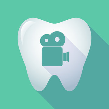 long shadow tooth icon with a film camera