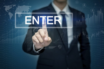 Businessman hand touching ENTER button on virtual screen