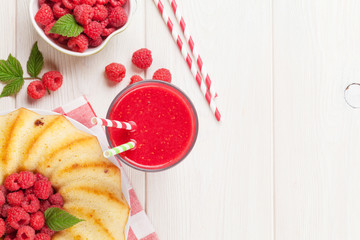 Raspberry smoothie, cake and berries
