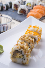Salmon and caviar rolls served on a plate