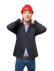 Happy young architect with relaxation gesture