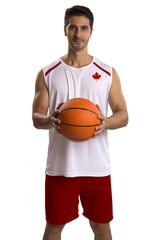 Professional Canadian basketball player with ball.
