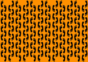 black footprints on an orange background