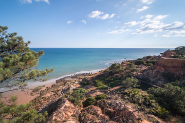 Wide view of the beautiful coastline of Olhos D'Agua near Vilamoura, Portugal.