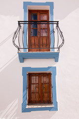 Close view of a typical window from the cubist town of Olhao, Portugal.