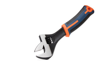 Close up view of an adjustable wrench isolated on a white background.