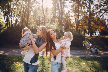 young family walking in the park