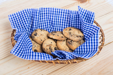 cookies with chocolate on a table in a basket