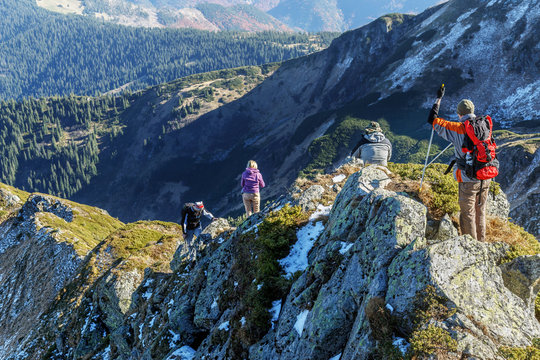 hikers at mountain ridge