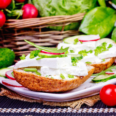 bread with curd cheese and chives.Shallow depth of field