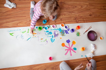 Two girls painting