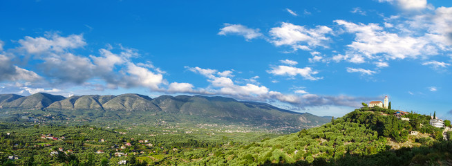 Fototapeta na wymiar Panorama of green inland of Zakynthos island with village in Greece