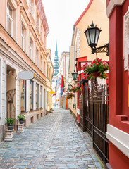 Narrow medieval street in old town Riga, Latvia.