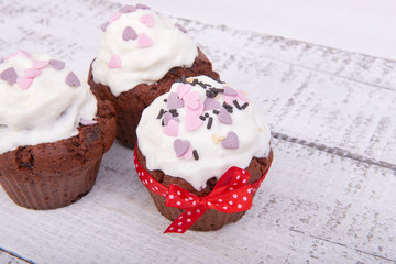 Chocolate cupcakes for Valentine's Day with caramel and whipped
