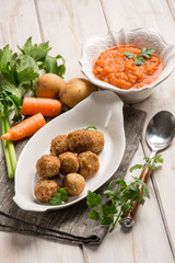 vegetarian meatballs with carrot cream sauce