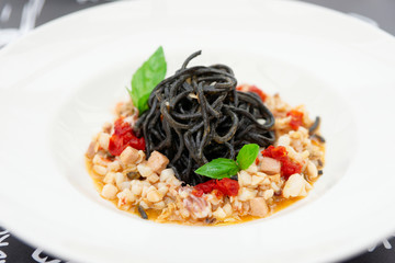 Black squid ink pasta with seafood