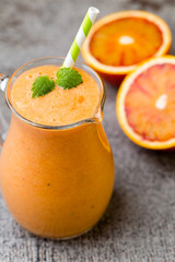 Red Orange Smoothie, decor mint leaves.