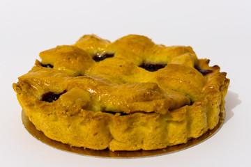 Cherry pie, cake seen from the side on a white background