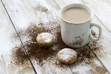 Cookie, cocoa and cup of coffee on wooden table